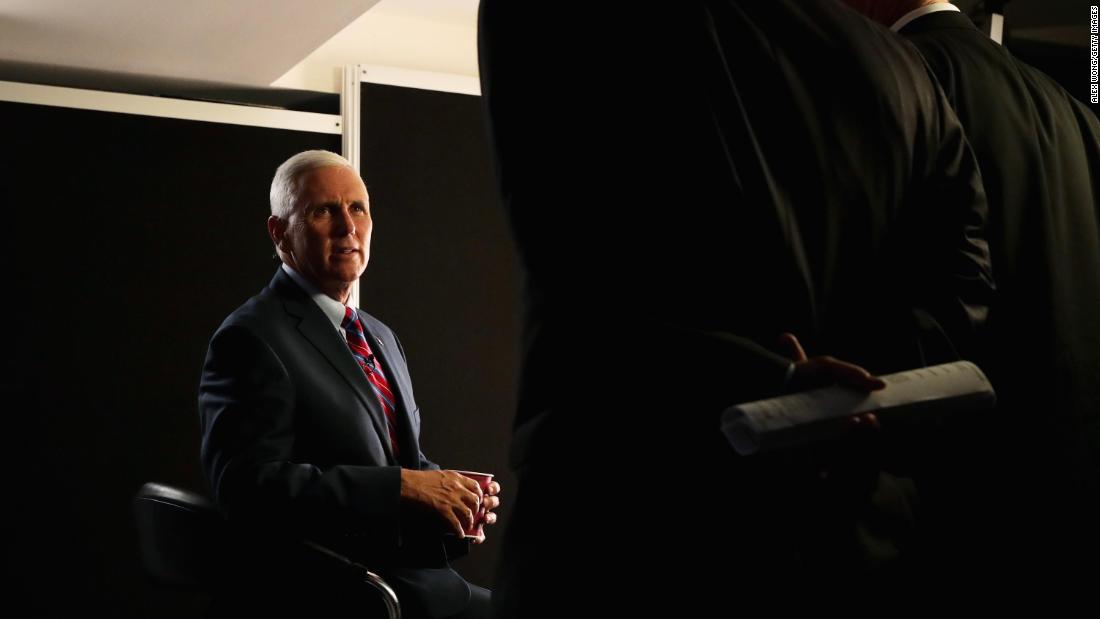 Pence prepares for an interview prior to the start of the fourth day of the Republican National Convention in July 2016.