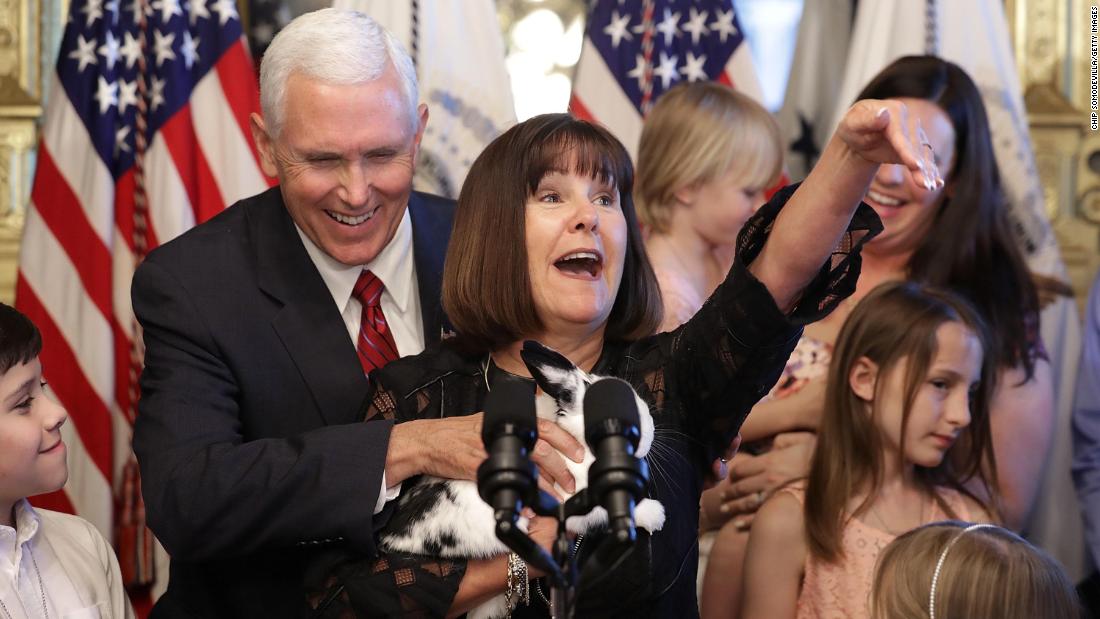 Mike and Karen Pence hold their family rabbit Marlon Bundo during an event celebrating military families in May 2017.