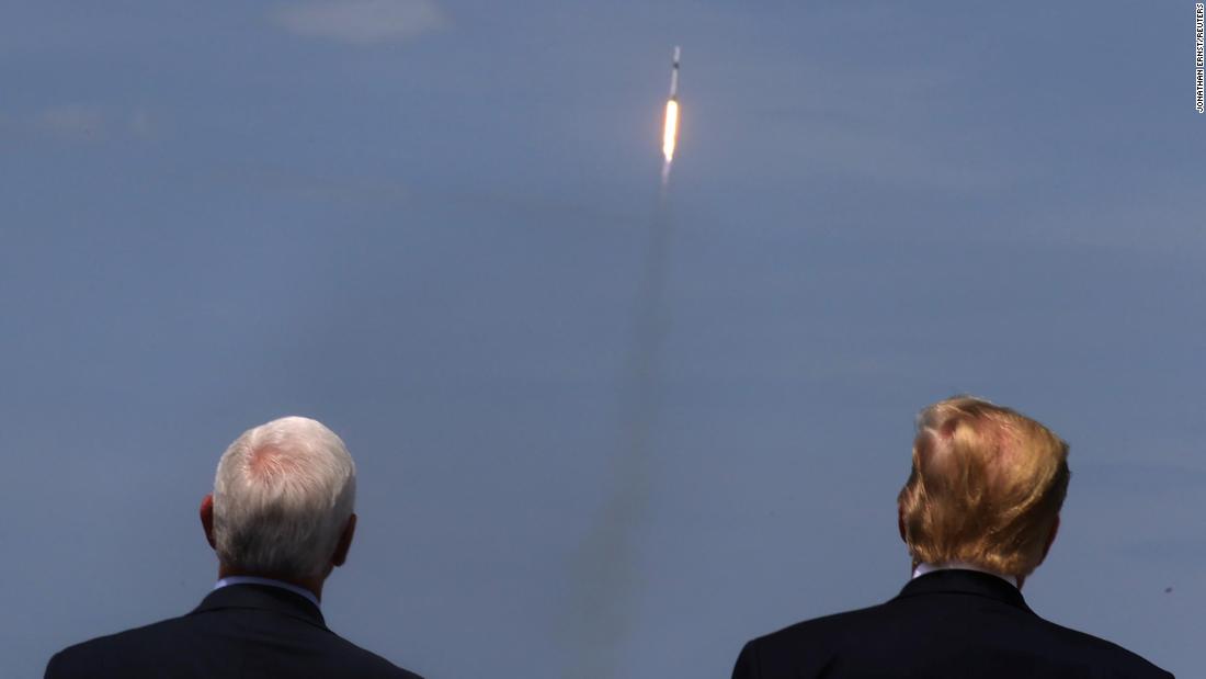 Pence and Trump watch the launch of a SpaceX Falcon 9 rocket in May 2020. It marked the first time in history that a commercial aerospace company carried humans into Earth&#39;s orbit.