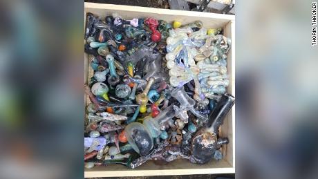 Melted piles of what were locally made glass pipes and bongs sold at Canyon Cannabis dispensary in Gates, Oregon.  Canyon Cannabis was destroyed by the Beachie Creek fire on September 8, 2020.