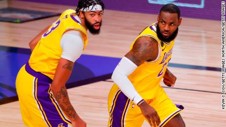 Anthony Davis (left) and LeBron James (right) made a combined 59 points, 22 rebounds and 14 assists in Game 1 of the NBA Finals.