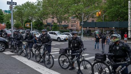 NYPD prepares to make arrest as protesters break the citywide curfew on June 4, 2020 in the Bronx borough of New York City.