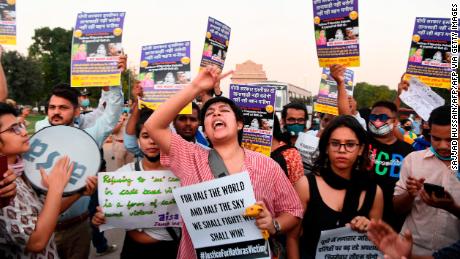 Protesters gather in New Delhi on September 30 after a 19-year-old woman died from an alleged gang rape in Uttar Pradesh, India. 