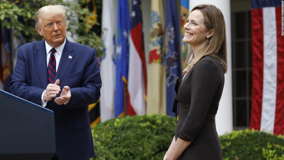 Judge Amy Coney Barrett reacts as Trump &lt;a href=&quot;https://www.cnn.com/2020/09/26/politics/amy-coney-barrett-supreme-court-nominee/index.html&quot; target=&quot;_blank&quot;&gt;introduces her as his Supreme Court nominee&lt;/a&gt; in September 2020. &lt;a href=&quot;http://www.cnn.com/2020/10/09/politics/gallery/amy-coney-barrett/index.html&quot; target=&quot;_blank&quot;&gt;She was confirmed&lt;/a&gt; a month later by a Senate vote of 52-48.