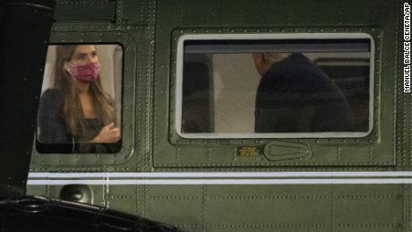 Hope Hicks, left, is seated across President Donald Trump inside Marine One as it lands on the South Lawn at the White House, Monday, Sept. 14, 2020, in Washington. (AP Photo/Manuel Balce Ceneta)
