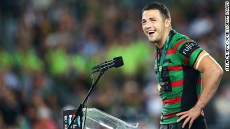 Burgess receives the Clive Churchill medal after the NRL Grand Final in 2014.