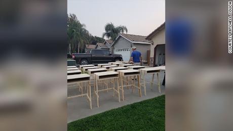 Mitchell Couch built 40 desks in one week with the help of his family.
