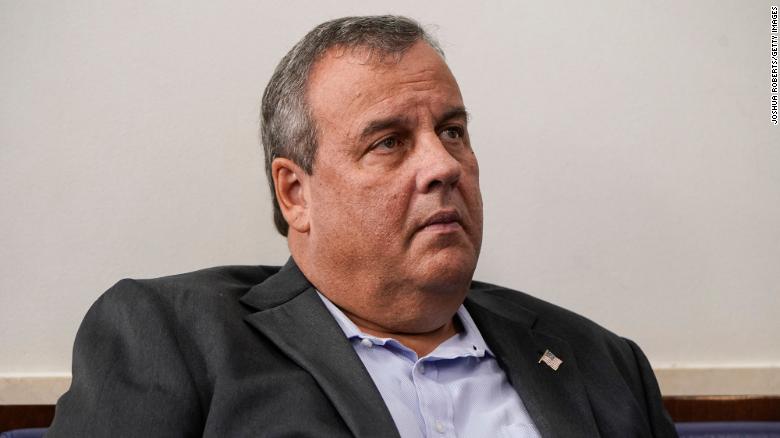 Former New Jersey Governor Chris Christie listens as US President Donald Trump speaks during a news conference in the Briefing Room of the White House on September 27, 2020 in Washington, DC.