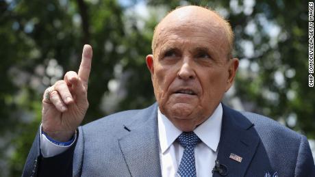 Rudy Giuliani's conspiracy theories could be dangerous to democracy, experts say