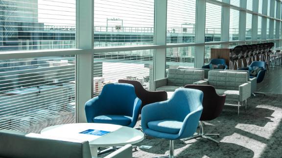 Get access to an airport oasis like the American Express Centurion Lounge at New York