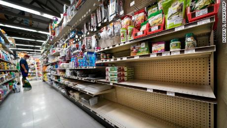 Shelves usually stocked with Mason jars and lids sit mostly empty at the Drillen True Value hardware store in South Portland, Maine, on September 4, 2020.