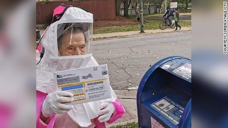 Bea Lumpkin, 102, cast her vote in the 2020 election by mail, decked out in personal protective equipment. She told CNN this election is one of the most critical of her lifetime. 