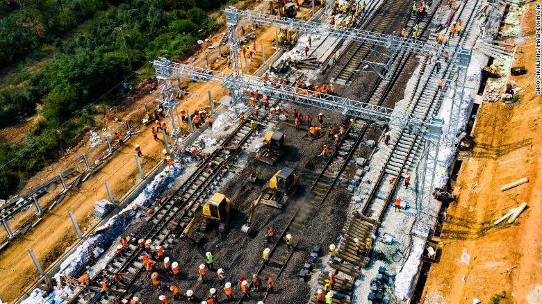 An aerial view from September 2019 of constructors finishing Haolebaoji-Ji&#39;an Railway, a railway aiming at delivering coal from its mine to the market, in Jiangxi province.