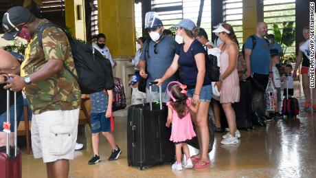 Tourists are evacuated from their hotel in Puerto Morelos, Quintana Roo State, Mexico, in preparation for the arrival of Hurricane Delta.