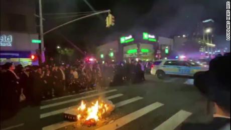 Members of Orthodox Jewish community protest for a second night in Brooklyn over new Covid-19 restrictions