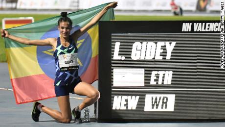 Ethiopia&#39;s Letesenbet Gidey celebrates after breaking the 5,000m world record.