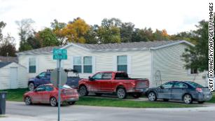 Vehicles are seen outside of a Hartland Township mobile home park the FBI searched late Wednesday night and into the morning in connection of a plot to kidnap Michigan Gov. Gretchen Whitmer.