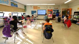 Meelai Chow, a teacher at Yung Wing School P.S. 124 teaches students attending class in person on October 01, 2020 in New York City. The start of in-person learning was delayed in New York City schools via a phased in reopening, beginning on September 29th for K - 5th grade..