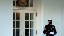 WASHINGTON, DC - OCTOBER 08: A U.S. Marine stands guard outside the West Wing at the White House October 08, 2020 in Washington, DC. According to the White House, President Donald Trump was in the Oval Office Thursday, four days after returning from from Walter Reed National Military Medical Center after testing positive and being treated for COVID-19. (Photo by Chip Somodevilla/Getty Images)