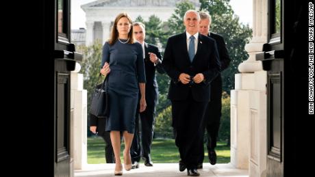Judge Amy Coney Barrett, President Donald Trump's nominee to the Supreme Court, and Vice President Mike Pence arrive at the Capitol.