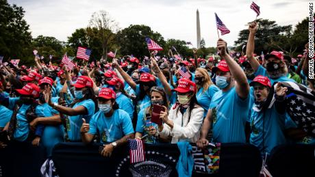 Supporters cheer as President Donald Trump makes remarks on law and order on the South Lawn of the White House on Saturday, where there was little social distancing. (Samuel Corum/Getty Images)