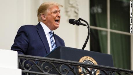 WASHINGTON, DC - OCTOBER 10: U.S. President Donald Trump addresses a rally in support of law and order on the South Lawn of the White House on October 10, 2020 in Washington, DC. President Trump invited over two thousand guests to hear him speak just a week after he was hospitalized for COVID-19. (Photo by Samuel Corum/Getty Images)