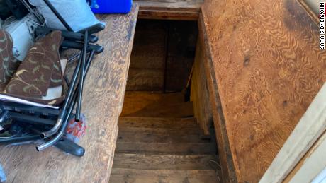 The FBI called this a trap door, but Vac Shack owner Briant Titus told CNN it was just the way to his basement.