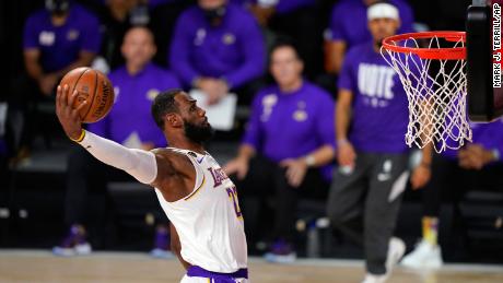 Los Angeles Lakers&#39; LeBron James (23) dunks during the first half in Game 6 of basketball&#39;s NBA Finals against the Miami Heat Sunday, Oct. 11, 2020, in Lake Buena Vista, Fla. (AP Photo/Mark J. Terrill)