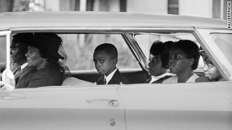 Ben Chaney, center, in the car on the way to his brother&#39;s funeral, August 1964, Mississippi (Bill Eppridge).