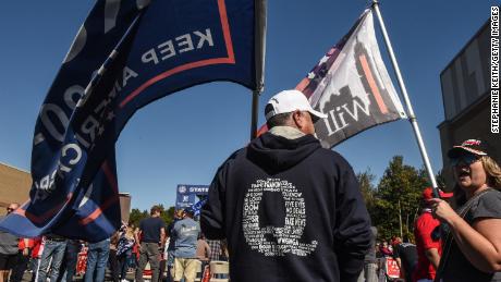 A person wears a QAnon sweatshirt during a pro-Trump rally on October 3 in the borough of Staten Island in New York City. 