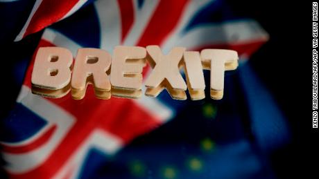 This picture taken in Brussels on January 5, 2020 shows the flags of the United Kingdom and the European Union next to the &quot;Brexit&quot; word. (Photo by Kenzo TRIBOUILLARD / AFP) (Photo by KENZO TRIBOUILLARD/AFP via Getty Images)