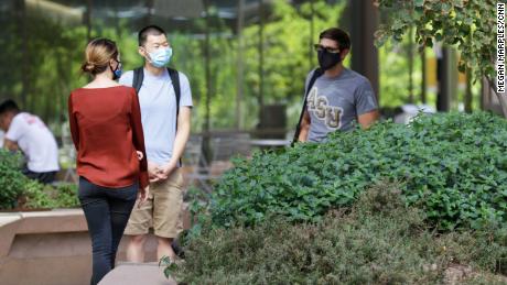 Students are required to wear masks on campus, even outside buildings. 