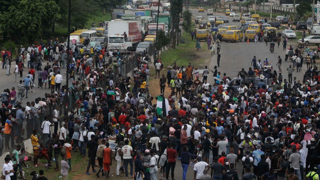 Demonstrators block a major road in Lagos on October 14.