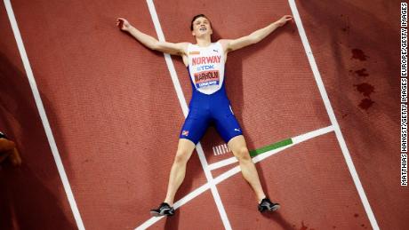 Warholm catches his breath after winning gold at the World Athletics Championships in Doha. 