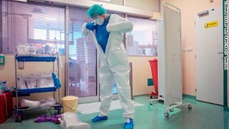 A healthcare worker wears personal protective equipment at a hospital in Prague on Wednesday.