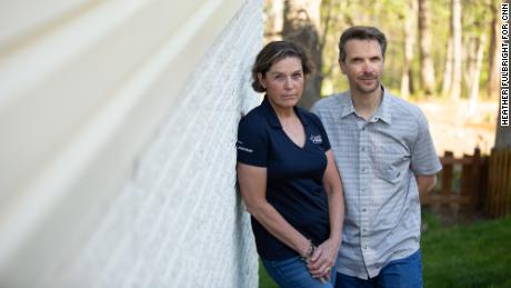 Matt and Maatje Benassi pose for a portrait on Wednesday, April 22. Maatje, a mother of two and US Army reservist, has become the target of conspiracy theorists who falsely claim she was coronavirus patient zero.