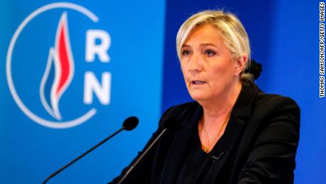 Head of far-right party Rassemblement National Marine Le Pen speaks to the press three days after the beheading of Samuel Paty.