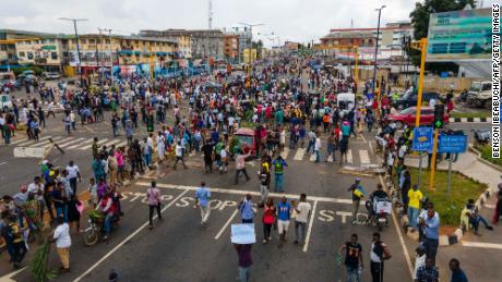 Protesters crowd the streets during a demonstration against police brutality in Ikeja, Lagos, on October 19, 2020.