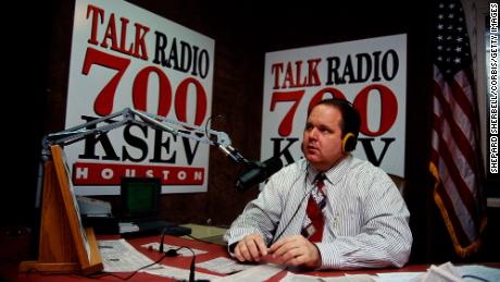 Rush Limbaugh sits at his desk at Talk Radio 700 KSEV during the Republican National Convention in Houston. (Photo by Shepard Sherbell/Corbis/Getty Images)