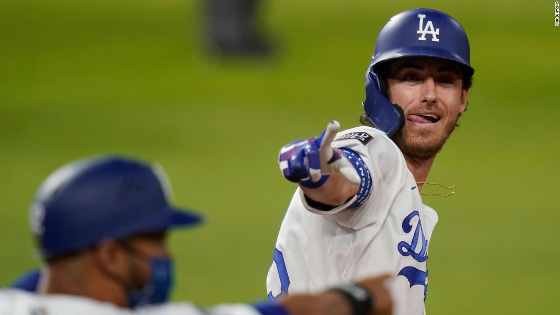 Los Angeles Dodgers&#39; Cody Bellinger celebrates his two-run home run in the fourth inning of Game 1 on Tuesday, October 20. The Dodgers defeated the Rays 8-3 to take a 1-0 lead in the series.