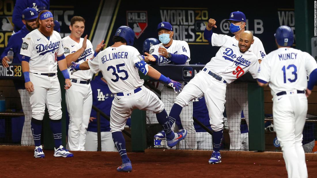 Cody Bellinger and Mookie Betts celebrate after Bellinger&#39;s fourth inning home run.