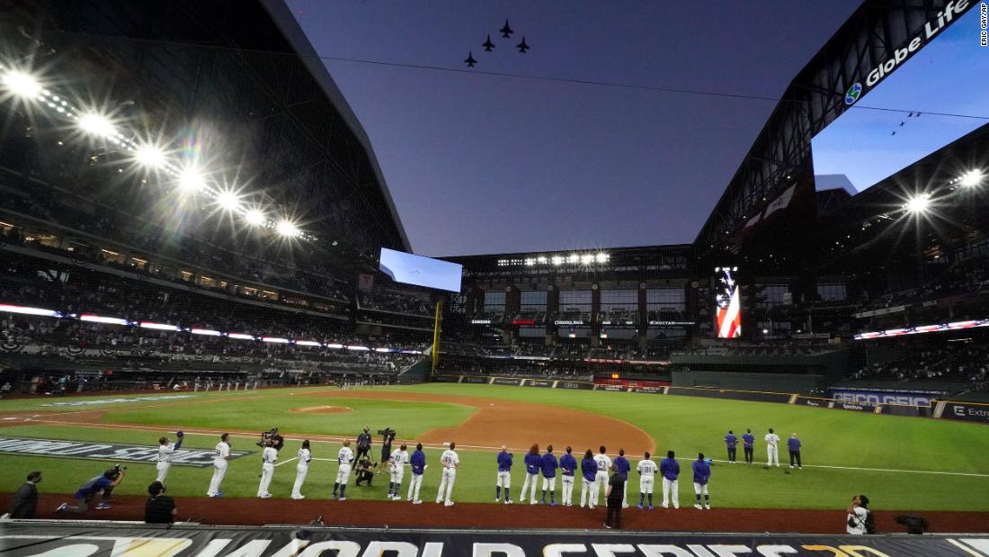 Jets fly over Globe Life Field in Arlington before the start of Game 1.