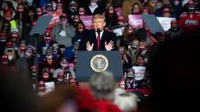 US President Donald Trump addresses supoorters during a Make America Great Again rally as he campaigns at Erie International Airport in Erie, Pennsylvania, October 20, 2020.