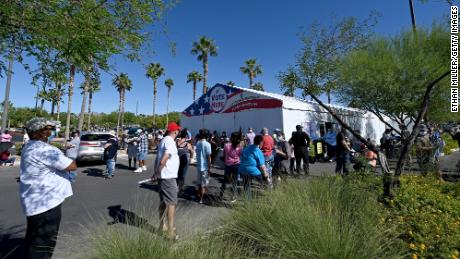 People line up to vote at a shopping center on October 17, 2020 in Las Vegas.