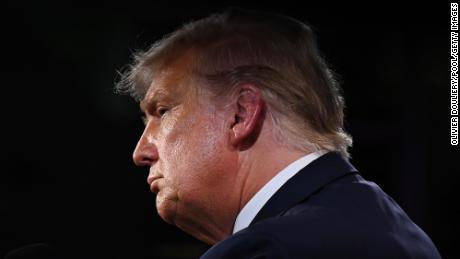 U.S. President Donald Trump listens during the first presidential debate against former Vice President and Democratic presidential nominee Joe Biden at the Health Education Campus of Case Western Reserve University on September 29, 2020 in Cleveland, Ohio. This is the first of three planned debates between the two candidates in the lead up to the election on November 3. (Photo by Olivier Douliery-Pool/Getty Images)