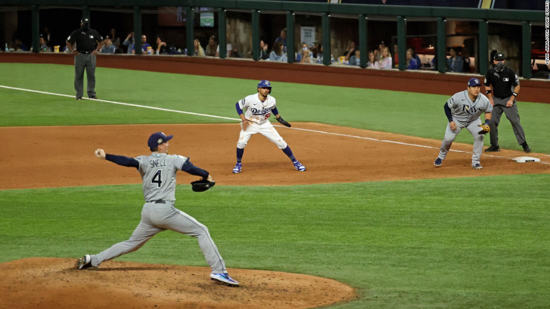 Dodgers right fielder Mookie Betts leads off of first base in the fifth inning.