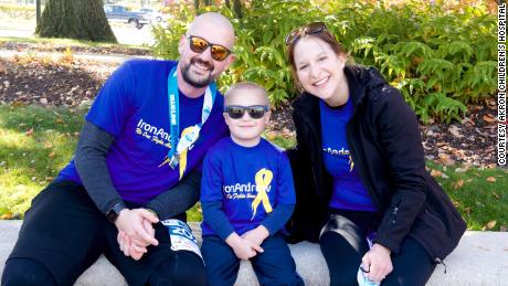 Kolt Codner and his family smile for a photo after completing his marathon race for Akron Children&#39;s Hospital. 
