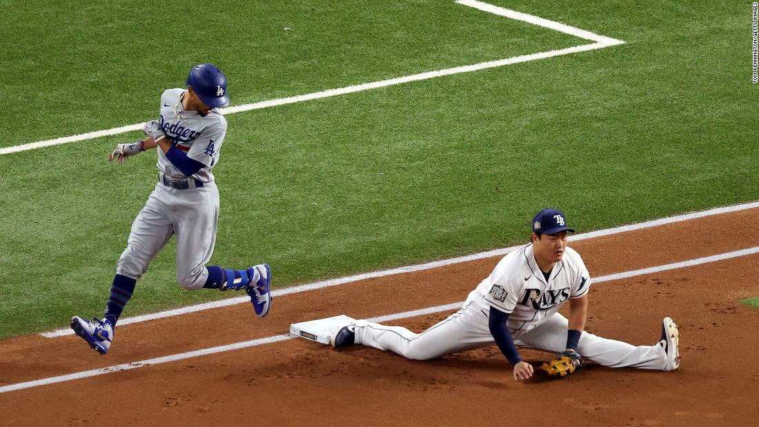 The Rays&#39; Choi stretches to make the putout against Mookie Betts during Game 3&#39;s first inning.