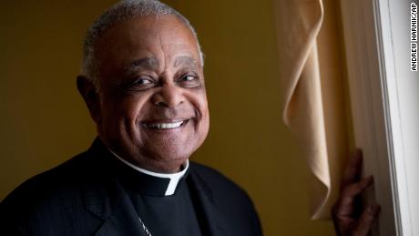 FILE - This Sunday, June 2, 2019, file photo shows Washington D.C. Archbishop Wilton Gregory posed for a portrait following mass at St. Augustine Church in Washington. Pope Francis has  named 13 new cardinals, including Washington D.C. Archbishop Wilton Gregory, who would become the first Black U.S. prelate to earn the coveted red cap. In a surprise announcement from his studio window to faithful standing below in St. Peter&#39;s Square, Sunday, Oct. 25, 2020, Francis said the churchmen would be elevated to a cardinal&#39;s rank in a ceremony on Nov. 28. (AP Photo/Andrew Harnik, File)