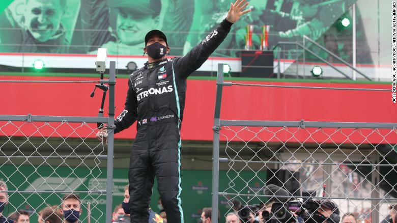 Hamilton celebrates after winning the Portuguese Grand Prix.